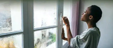 Eine Frau am Fenster