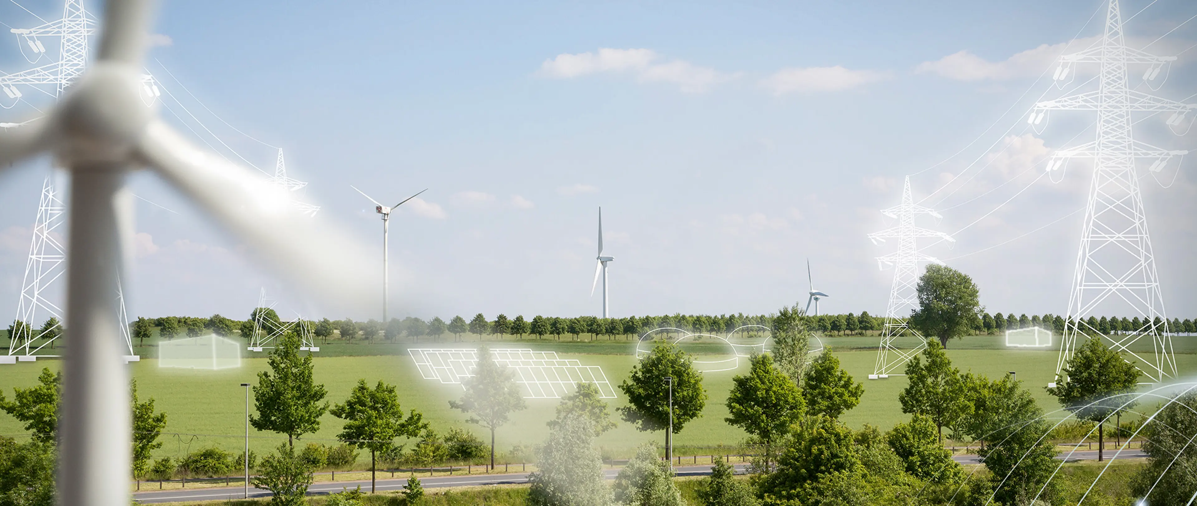 Windkraft Foto einer Landschaft mit Windkraftanlagen, in das die Renderings zweier Batteriespeicher einer Agri-PV-Anlage, einer Biogasanlage und zweier Strommasten integriert wurden.