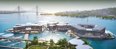 Dieser Entwurf zeigt modulare Inseln im Wasser, die variabel zu Dörfern und Städten verbunden werden können. Im Hintergrund ist eine Stadt und eine große Brücke zu sehen.