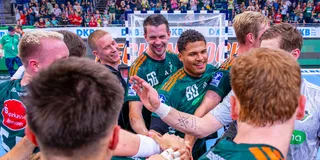 Team celebration in handball match
